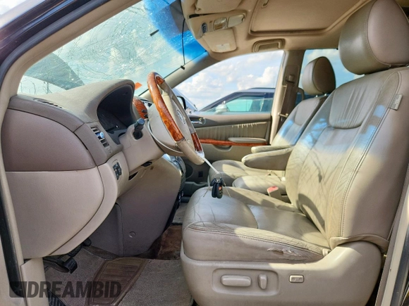 2009 Toyota Sienna XLE with VIN 5TDZK22C29S231769, listed as a Copart auction lot 64512415 with 182,637 mi miles and Clean title. Bid and sale history available at DreamBid. Image 7.