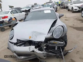 2023 Porsche 911 Carrera with VIN WP0AA2A93PS206048, listed as a IAAI auction lot 42022225 with 6,439 mi miles and . Bid and sale history available at DreamBid. Image 12.