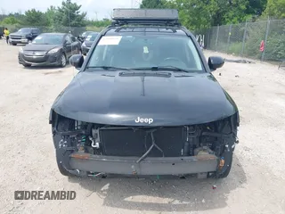2017 Jeep Compass Latitude with VIN 1C4NJDEB7HD171563, listed as a IAAI auction lot 42669131 with 125,411 mi miles and . Bid and sale history available at DreamBid. Image 13.