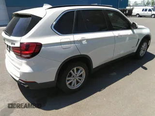 2014 BMW X5 xDrive35i z VIN 5UXKR0C56E0H20868, wystawiony jako IAAI lot #42321833 z przebiegiem 134 064 mil mil oraz . Historia ofert i sprzedaży dostępna na DreamBid. Obrazek 4.