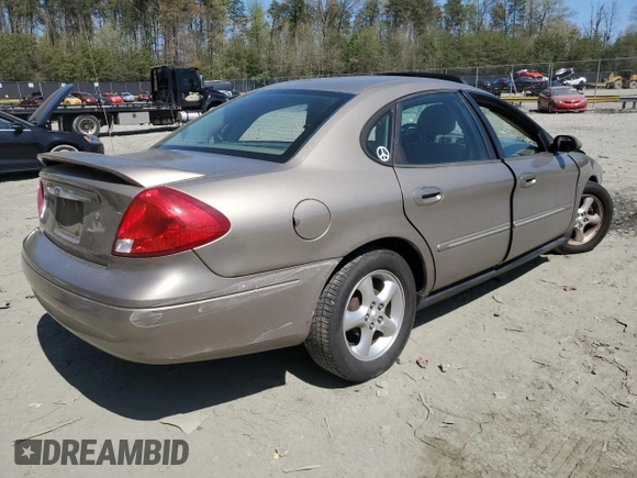 2003 Ford Taurus SEL Deluxe with VIN 1FAHP56SX3G199970, listed as a Copart auction lot 53042795 with 212,802 mi miles and Salvage Title. Bid and sale history available at DreamBid. Image 3.
