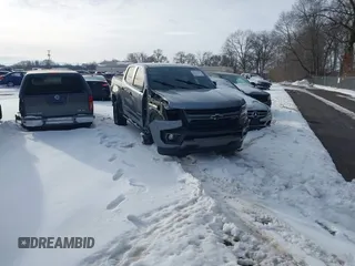 2021 Chevrolet Colorado 4WD Z71 z VIN 1GCGTDEN6M1247525, wystawiony jako IAAI lot #41623134 z przebiegiem 42 835 mil mil oraz . Historia ofert i sprzedaży dostępna na DreamBid. Obrazek 1.
