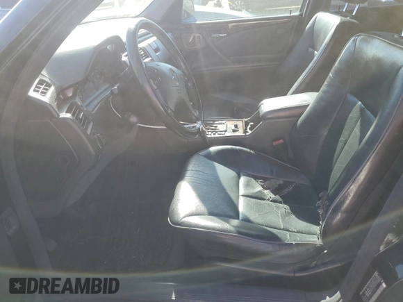 2001 Mercedes-Benz E-Class with VIN WDBJF70JX1B327997, listed as a Copart auction lot 87650175 with 268,045 mi miles and Salvage Title. Bid and sale history available at carsss.com. Image 7.