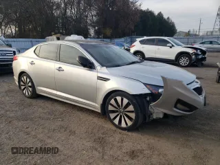 2012 Kia Optima SX z VIN KNAGR4A66C5294734, wystawiony jako Copart lot #55164005 z przebiegiem 286 417 mil mil oraz Szkoda całkowita • Salvage title. Historia ofert i sprzedaży dostępna na DreamBid. Obrazek 4.