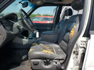 2002 Ford Explorer Sport Trac Value with VIN 1FMZU67E42UD15004, listed as a Copart auction lot 54129135 with 129,952 mi miles and Salvage title. Bid and sale history available at DreamBid. Image 7.