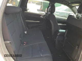 2019 Jeep Grand Cherokee Altitude with VIN 1C4RJEAG9KC662240, listed as a Copart auction lot 52871935 with 123,188 mi miles and Salvage title. Bid and sale history available at DreamBid. Image 11.