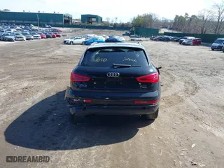 2015 Audi Q3 2.0T Premium Plus with VIN WA1EFCFS4FR001441, listed as a IAAI auction lot 41813239 with 112,795 mi miles. Bid and sale history available at carsss.com. Image 16.