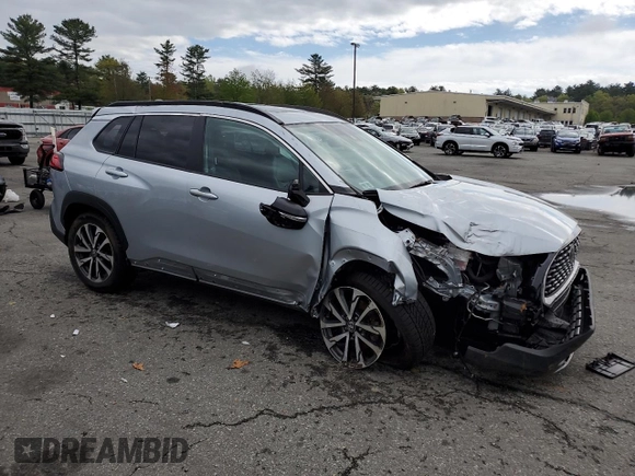 2022 Toyota Corolla Cross XLE with VIN 7MUDAABG2NV009663, listed as a Copart auction lot 55945735 with 59,473 mi miles and Salvage title. Bid and sale history available at DreamBid. Image 4.