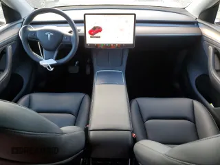 2024 Tesla Model Y Long Range with VIN 7SAYGDEE6RA318973, listed as a Copart auction lot 55586435 with 8,700 mi miles and Salvage title. Bid and sale history available at DreamBid. Image 8.