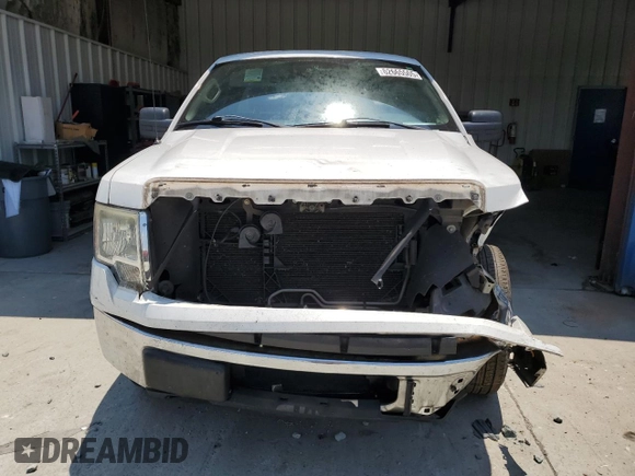 2012 Ford F-150 XL with VIN 1FTNF1CF9CKD27242, listed as a Copart auction lot 62665505 with 202,023 mi miles and Salvage title. Bid and sale history available at DreamBid. Image 5.