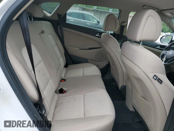 2016 Hyundai Tucson SE z VIN KM8J33A47GU167064, wystawiony jako Copart lot #56566545 z przebiegiem 101 703 mil mil oraz Szkoda całkowita • Salvage title. Historia ofert i sprzedaży dostępna na DreamBid. Obrazek 10.
