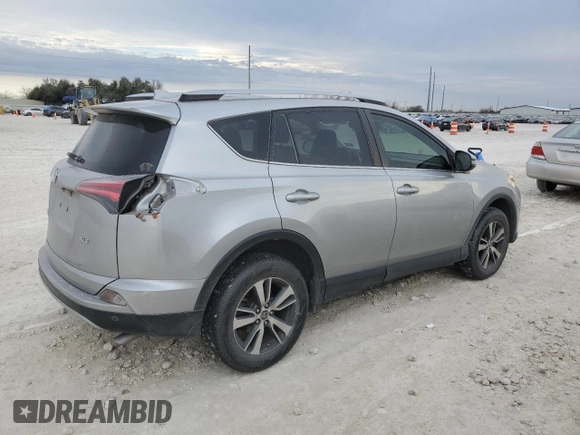 2018 Toyota RAV4 XLE with VIN JTMWFREV3JJ180152, listed as a Copart auction lot 46949465 with 103,346 mi miles and Clean Title. Bid and sale history available at DreamBid. Image 3.