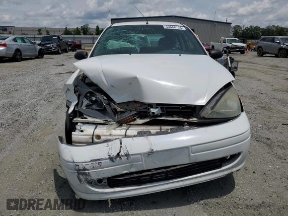 2003 Ford Focus ZX3 with VIN 3FAFP31383R117755, listed as a Copart auction lot 60668725 with 135,856 mi miles and Salvage title. Bid and sale history available at DreamBid. Image 5.