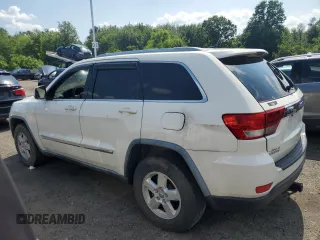 2011 Jeep Grand Cherokee Laredo with VIN 1J4RR4GG8BC572470, listed as a Copart auction lot 64953985 with 171,777 mi miles and Clean title. Bid and sale history available at DreamBid. Image 2.
