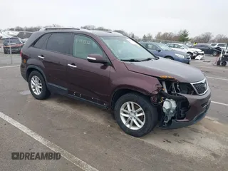 2015 Kia Sorento LX with VIN 5XYKTCA61FG568054, listed as a IAAI auction lot 41995522 with 229,631 mi miles. Bid and sale history available at carsss.com. Image 1.