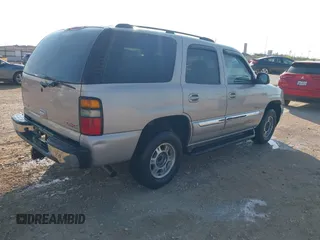 2005 GMC Yukon SLT with VIN 1GKEK13T95R203827, listed as a IAAI auction lot 41815086 with 136,671 mi miles. Bid and sale history available at carsss.com. Image 4.