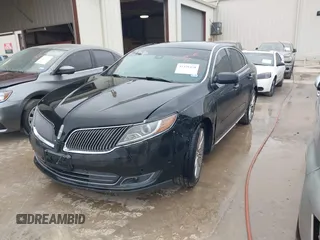 2013 Lincoln MKS EcoBoost with VIN 1LNHL9FT2DG604724, listed as a IAAI auction lot 41428420 with 152,880 mi miles and . Bid and sale history available at DreamBid. Image 2.