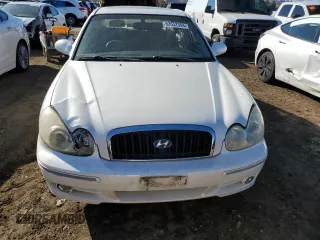 2004 Hyundai Sonata GLS with VIN KMHWF35HX4A975027, listed as a Copart auction lot 82652354 with 148,296 mi miles and Salvage Title. Bid and sale history available at carsss.com. Image 5.