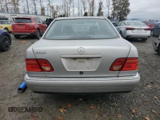 1999 Mercedes-Benz E-Class with VIN WDBJF65H5XA906877, listed as a Copart auction lot 76156014 with 141,956 mi miles and Clean Title. Bid and sale history available at carsss.com. Image 6.