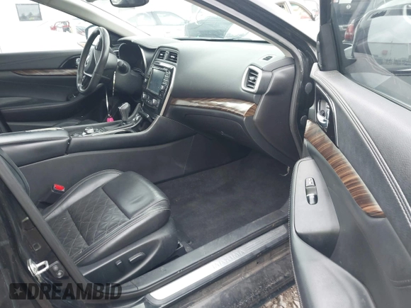 2016 Nissan Maxima SL with VIN 1N4AA6AP5GC413627, listed as a IAAI auction lot 42468940 with 209,558 mi miles and . Bid and sale history available at DreamBid. Image 5.