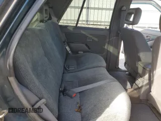 1995 Honda Passport z VIN 4S6CM58V5S4429972, wystawiony jako Copart lot #84513174 z przebiegiem 129 872 mil mil oraz Szkody całkowita. Historia ofert i sprzedaży dostępna na DreamBid. Obrazek 11.