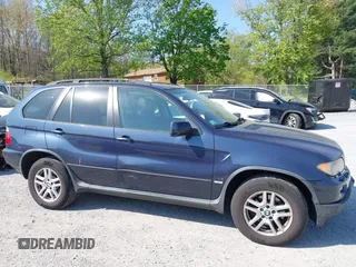 2005 BMW X5 3.0i with VIN 5UXFA13505LY15694, listed as a IAAI auction lot 42051677 with 104,559 mi miles. Bid and sale history available at carsss.com. Image 6.