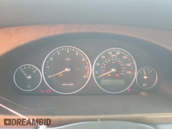2002 Jaguar X-Type z VIN SAJEA51C02WC53526, wystawiony jako Copart lot #53761265 z przebiegiem 156 584 mil mil oraz Czysty tytuł • Clean title. Historia ofert i sprzedaży dostępna na DreamBid. Obrazek 9.