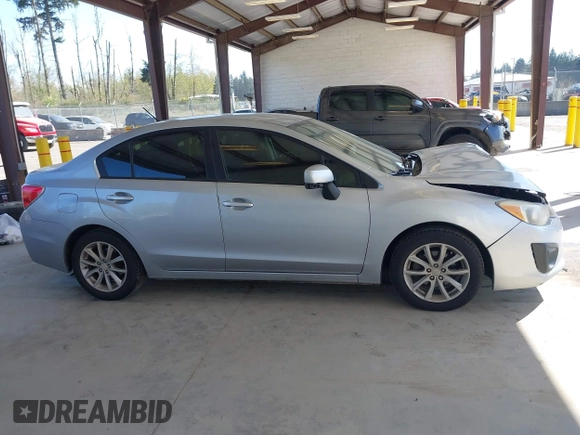 2013 Subaru Impreza Premium z VIN JF1GJAC63DH016174, wystawiony jako IAAI lot #42047371 z przebiegiem 172 377 mil mil oraz . Historia ofert i sprzedaży dostępna na DreamBid. Obrazek 13.