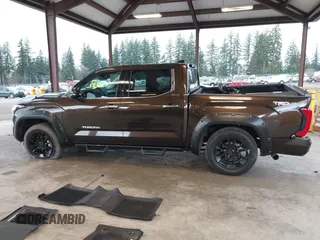 2023 Toyota Tundra Limited with VIN 5TFJA5DB9PX125400, listed as a IAAI auction lot 41336129 with 12,384 mi miles and . Bid and sale history available at DreamBid. Image 15.