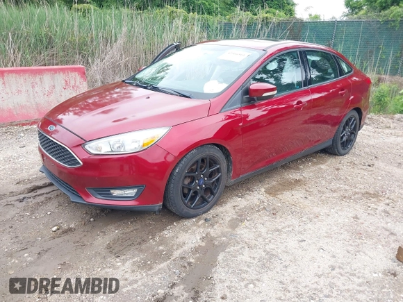 2016 Ford Focus SE with VIN 1FADP3F28GL266971, listed as a IAAI auction lot 42366561 with 67,390 mi miles and . Bid and sale history available at DreamBid. Image 2.