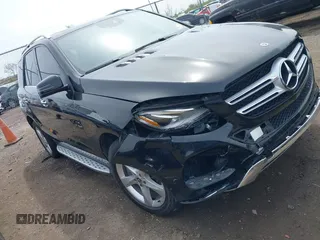 2018 Mercedes-Benz GLE 350 with VIN 4JGDA5HB8JB168343, listed as a IAAI auction lot 42039679 with 104,824 mi miles and . Bid and sale history available at DreamBid. Image 1.