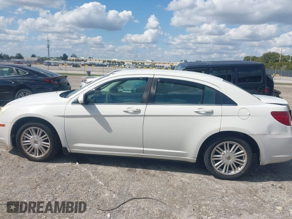 2007 Chrysler Sebring Touring with VIN 1C3LC56K37N533469, listed as a IAAI auction lot 42001566 with 187,698 mi miles and . Bid and sale history available at DreamBid. Image 14.