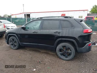 2016 Jeep Cherokee Latitude with VIN 1C4PJMCBXGW112540, listed as a IAAI auction lot 42336449 with 94,774 mi miles and . Bid and sale history available at DreamBid. Image 14.