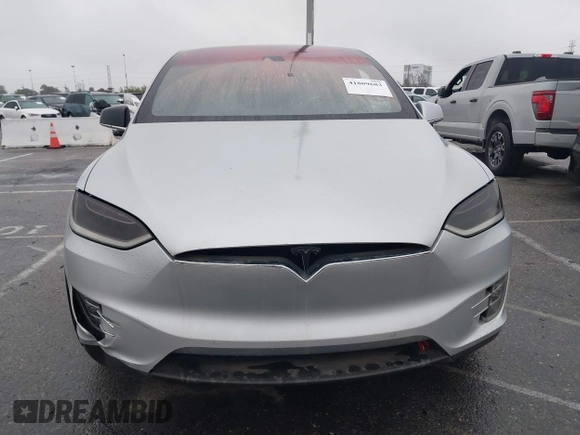 2016 Tesla Model X P90D with VIN 5YJXCBE41GF006284, listed as a IAAI auction lot 41809683 with 71,135 mi miles. Bid and sale history available at carsss.com. Image 12.
