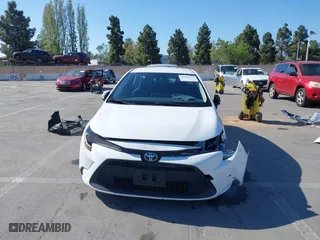 2021 Toyota Corolla Hybrid LE with VIN JTDEAMDE6MJ032371, listed as a IAAI auction lot 42086942 with 68,335 mi miles. Bid and sale history available at carsss.com. Image 13.