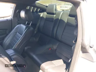 2013 Ford Mustang V6 with VIN 1ZVBP8AM4D5212653, listed as a IAAI auction lot 42090402 with 134,437 mi miles. Bid and sale history available at carsss.com. Image 8.