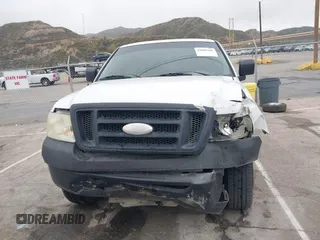 2007 Ford F-150 STX with VIN 1FTRX12W57FA45095, listed as a IAAI auction lot 41880108 with 168,216 mi miles and . Bid and sale history available at DreamBid. Image 12.