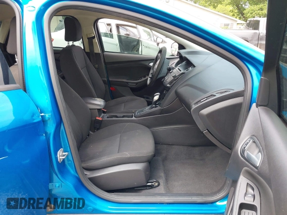 2015 Ford Focus SE z VIN 1FADP3F21FL274182, wystawiony jako IAAI lot #42441161 z przebiegiem 176 810 mil mil oraz . Historia ofert i sprzedaży dostępna na DreamBid. Obrazek 5.