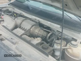 2010 Ford Econoline Cargo Commercial with VIN 1FTNE1EW2ADA91289, listed as a IAAI auction lot 42912067 with 79,696 mi miles and . Bid and sale history available at DreamBid. Image 12.