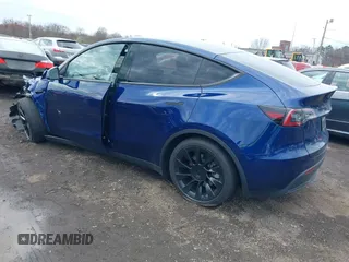 2023 Tesla Model Y Long Range with VIN 7SAYGDEE4PF891709, listed as a IAAI auction lot 41944893 with 15,864 mi miles. Bid and sale history available at carsss.com. Image 3.
