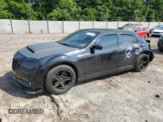 2012 Chrysler 300 C z VIN 2C3CCAET9CH256087, wystawiony jako Copart lot #60310495 z przebiegiem 145 585 mil mil oraz Szkoda całkowita • Salvage title. Historia ofert i sprzedaży dostępna na DreamBid. Obrazek 1.