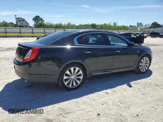 2013 Lincoln MKS EcoBoost with VIN 1LNHL9FT8DG603948, listed as a Copart auction lot 49908455 with 133,493 mi miles and Salvage title. Bid and sale history available at DreamBid. Image 3.