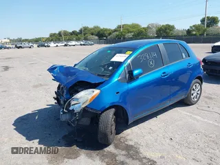 2009 Toyota Yaris with VIN JTDKT903X95257701, listed as a IAAI auction lot 41796420 with 86,953 mi miles. Bid and sale history available at carsss.com. Image 18.