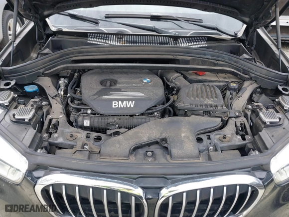 2018 BMW X1 xDrive28i with VIN WBXHT3C34J5K21576, listed as a IAAI auction lot 41822390 with 69,645 mi miles. Bid and sale history available at carsss.com. Image 10.