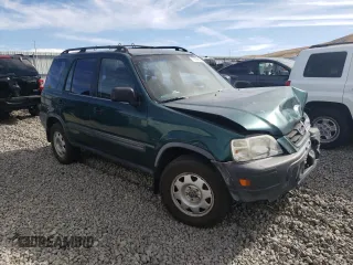 1999 Honda CR-V LX with VIN JHLRD1847XC036630, listed as a Copart auction lot 75708664 with 201,240 mi miles and Salvage Title. Bid and sale history available at carsss.com. Image 4.
