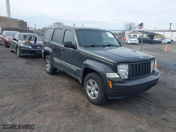 2011 Jeep Liberty Sport with VIN 1J4PN2GK2BW581496, listed as a IAAI auction lot 42080245 with 171,626 mi miles. Bid and sale history available at carsss.com. Image 1.
