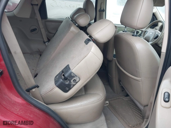 2005 Ford Escape Limited with VIN 1FMYU94155KA52665, listed as a IAAI auction lot 41736416 with 999,999 mi miles. Bid and sale history available at carsss.com. Image 8.