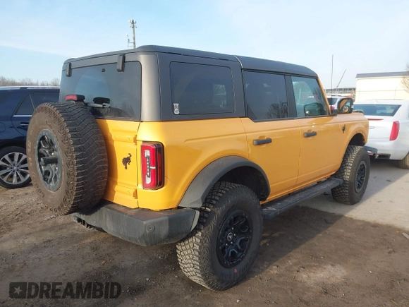 2022 Ford Bronco with VIN 1FMEE5DP8NLB67834, listed as a IAAI auction lot 41772622 with 58,667 mi miles. Bid and sale history available at carsss.com. Image 4.