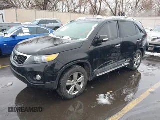 2012 Kia Sorento EX with VIN 5XYKUDA2XCG301636, listed as a IAAI auction lot 41619793 with 220,692 mi miles. Bid and sale history available at carsss.com. Image 2.