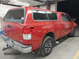 2011 Toyota Tundra 4WD Truck LTD with VIN 5TFBY5F12BX166531, listed as a IAAI auction lot 41680915 with 164,314 mi miles. Bid and sale history available at carsss.com. Image 4.